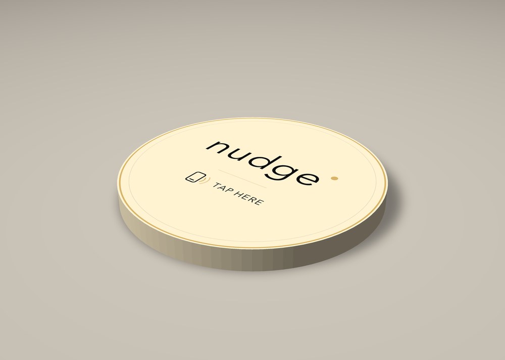 Nudge Tags tap plaque in sand